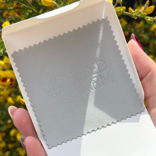 Licensed To Charm silver jewellery polishing cloth in branded sleeve
