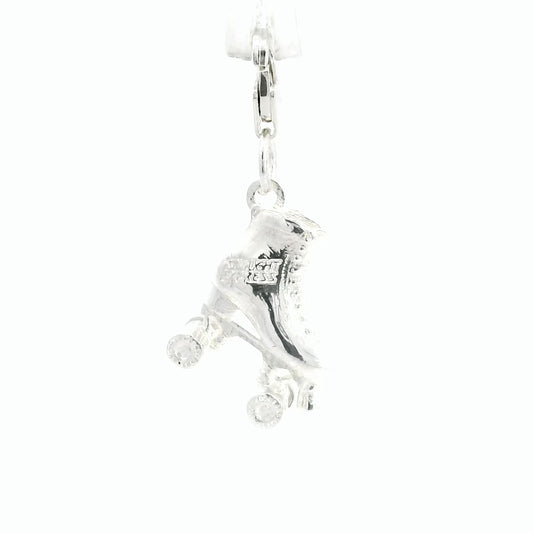 Official Starlight Express roller skate charm in recycled sterling silver with four wheels and clip-on clasp