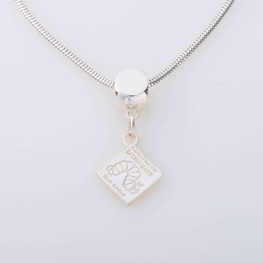 Handmade sterling silver book necklace featuring The Very Hungry Caterpillar title engraving. A charming literary-inspired jewellery piece for book lovers and Eric Carle fans.