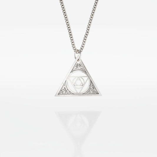 Aughra's Triangle Necklace in sterling silver, inspired by The Dark Crystal. Features the Eye of the superimposed suns within an intricate triangle design on a 45 cm trace chain. Perfect for fans of Jim Henson’s dark fantasy universe