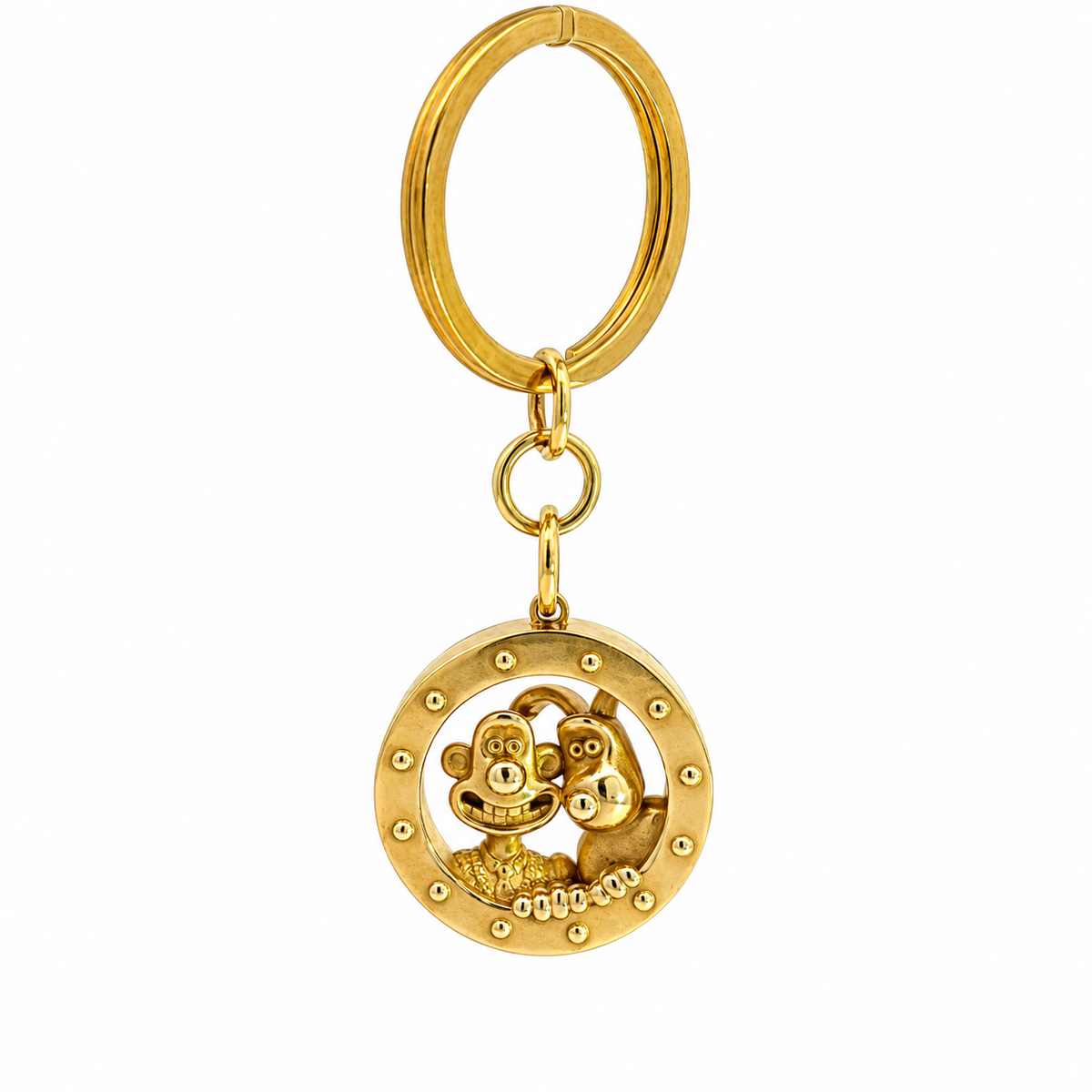 Wallace and Gromit brass porthole keyring on a white background
