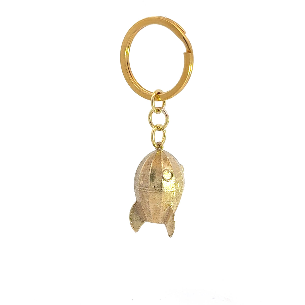 Side view of the brass Wallace & Gromit Rocket Keyring