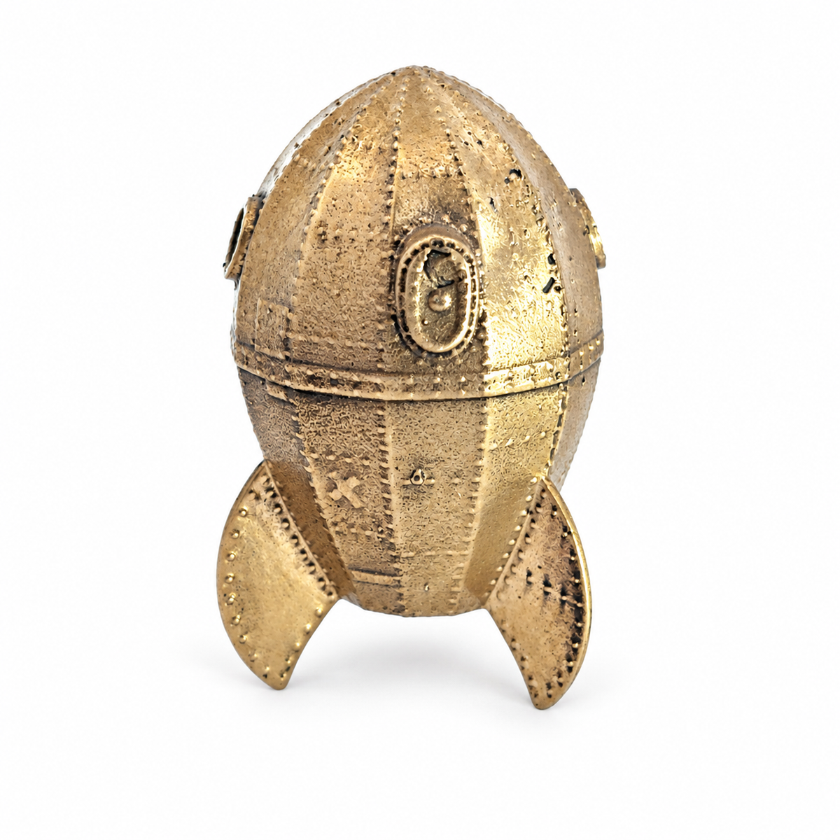 Side view of the A Grand Day Out bronze rocket miniature with circular porthole, metal panel detailing and curved fins.