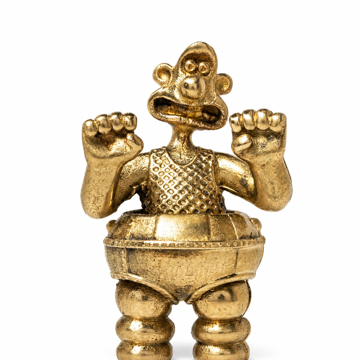 Close-up detail of Wallace in the Wrong Trousers miniature bronze figurine showing facial features and textured finish.