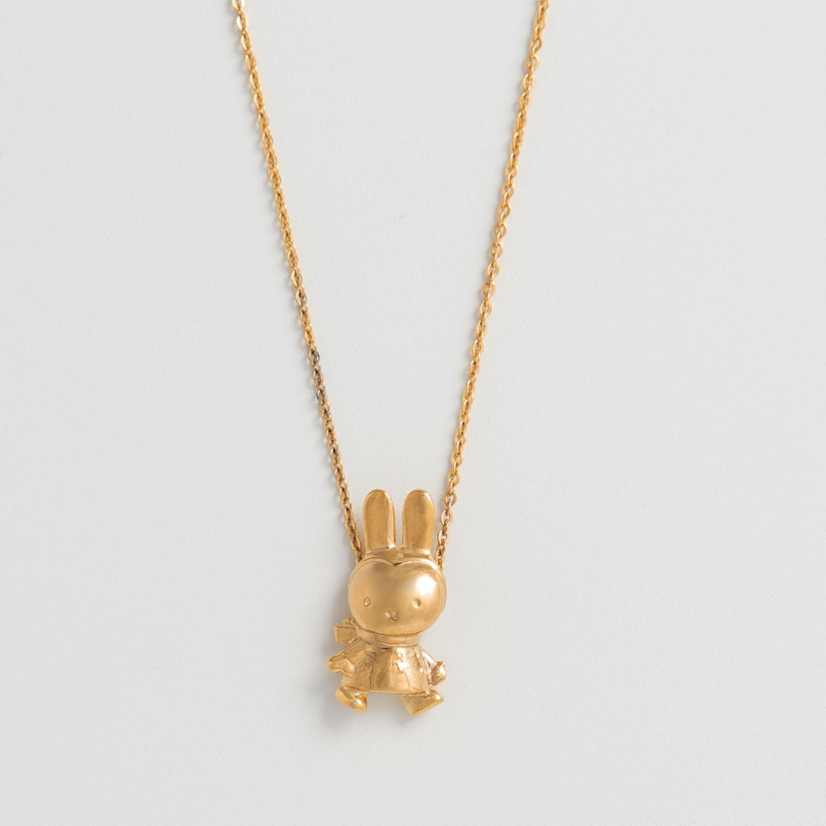 Winter Miffy Necklace in 18ct gold vermeil, featuring Miffy in a cosy coat and scarf. Handcrafted from recycled silver, perfect for gifting.